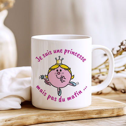 Mug en céramique blanc avec l'inscription humoristique "Je suis une princesse, mais pas du matin", idéal pour les matins difficiles.